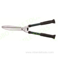 Home garden pruning green lawn shears vigorously prune fence prune courtyard prune branches prune flowers and grass shear